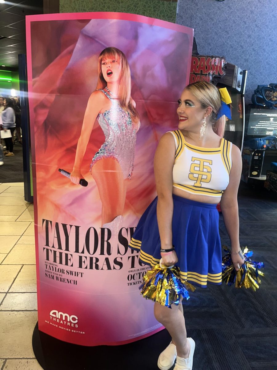 Lizzie dressed as the Shake it Off cheerleader for opening night.