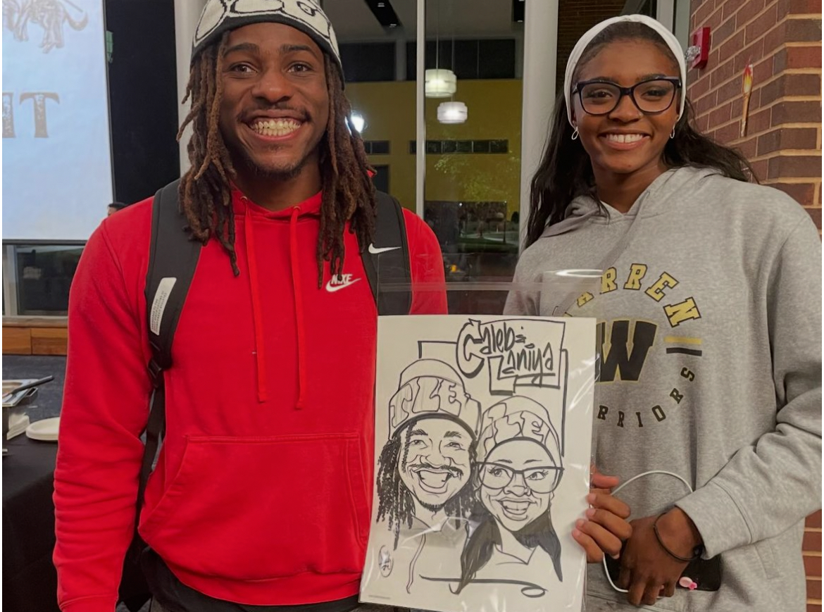 Students enjoy caricature art throughout the night. 