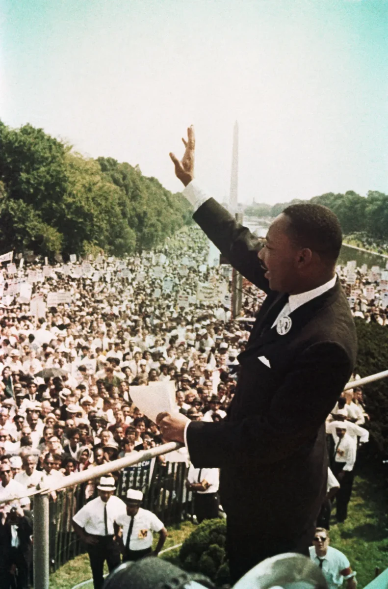 Martin Luther King Jr. waving to participants in March in Washington in August
28, 1963.
