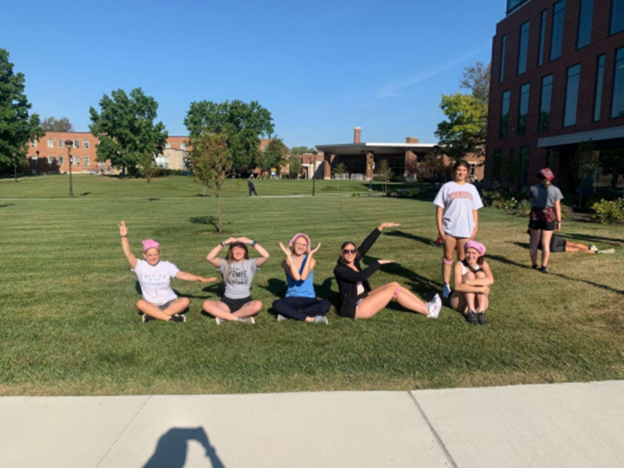 San Damiano Scholars enjoying a sunny day on Marian University's campus, embracing faith, friendship, and fun