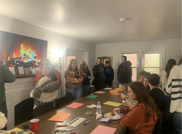 Talking Turkey: The scholars gather in the front room to list the things they are thankful for while enjoying the meal 